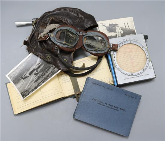 Two Pilots log books for W/S Lieutenant Jack Leonard Rushburne, South Africa Air Force, together with a leather